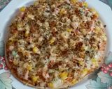 A picture of step 10 of Cheesy Mexican Veg Pizza.