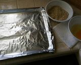 A picture of step 2 of Crispy Garlic parmesan zucchini chips.