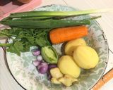 Foto langkah ke 2 dari resep Sup ikan nila campur kentang wortel.