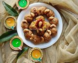A picture of step 4 of Cranberry & Mixed Nuts Besan Laddu.