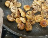 A picture of step 3 of Buttered Mushrooms in a little white wine and Balsamic Vinegar.