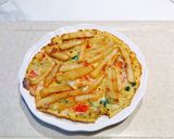 A picture of step 5 of Omelette (chips-egg omelette).