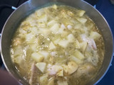 Filetes de pescado en salsa verde y patatas