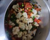 A picture of step 4 of Mix millet khichdi with vegetables.