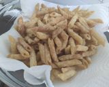 Foto del paso 5 de la receta: Snack de macarrones fritos aliñados (crackers)