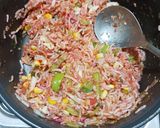 A picture of step 3 of Red Sauce Mexican Egg Rice.