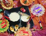 A picture of step 2 of Panchamrit 🙏🌹 Bhog Prasad and Krishna ji Abhisheka 🌹🌹🙏.