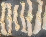 A picture of step 5 of Easy Homemade Cheesy Garlic Butter Twist Breadsticks.