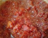 A picture of step 4 of Stewed pork chops in a marinara sauce.