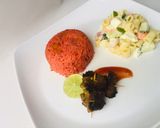 A picture of step 5 of Jollof rice.