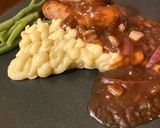 A picture of step 3 of Staffordshire Pork & Leek Sausages with Mustard Mash and the best Red Wine & Onion Gravy.