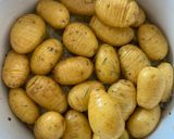 A picture of step 6 of Hasselback truffle roasted potatoes.