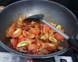 A picture of step 2 of Nam Ngiao (Northern Thai Pork Noodle Soup).
