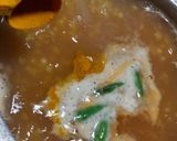 A picture of step 3 of Daal Chawal with fry Fish.