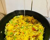 A picture of step 3 of Aloo Matar Chatpata Poha (Flattened rice with peas and potatoes).