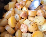 Une image de l'étape 2 de Pommes de terre au romarin.