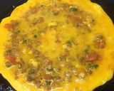 A picture of step 10 of Tawa omelete.