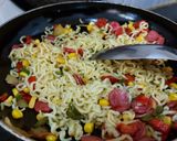 A picture of step 4 of Fried Instant noodles loaded with Sausages and vegies.