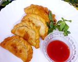 A picture of step 7 of Chicken Alu samosa.