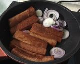 A picture of step 3 of Spam And Onion In Plum Sauce.