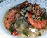 Foto del paso 7 de la receta: Judías del ganchet con almejas japonesas y gambas rojas