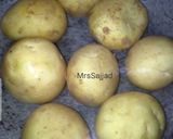 A picture of step 1 of Aloo ke prathay.