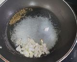 A picture of step 1 of Zeera baghar rice.