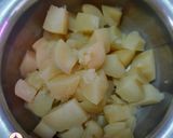 A picture of step 2 of Saragava Bateta nu Shak (drumstick potato curry).