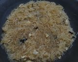 A picture of step 3 of Coconut Rice.