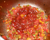 Foto del paso 11 de la receta: Pulpitos en salsa de tomates y pimientos