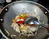 A picture of step 1 of Onion rice with tadka raita.