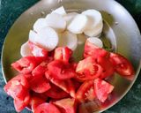 A picture of step 1 of Mula Tomato Khatta.
