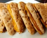 A picture of step 5 of My Melted Cheese & Red Onion Toasted Thins.🥰.
