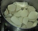 A picture of step 1 of Ofe nsala with chicken and pounded yam.