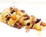 A picture of step 4 of Tagliatelle with Salamella Ragù, Pioppini Mushrooms, and Walnuts.
