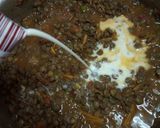 A picture of step 3 of Spicy lentils (kamande)in milk and cinnamon raisins chapati.