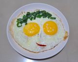 Foto langkah ke 3 dari resep Telur Ceplok Tersenyum.