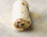 A picture of step 6 of Pin wheel bread sandwich.
