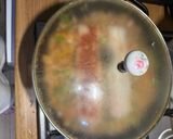 A picture of step 7 of One Pot Steamed White Fish and Savory Rice with Roasted Garlic and Tomato Sauce.