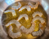 Foto del paso 3 de la receta: Estofado de alcachofas, almejas y langostinos
