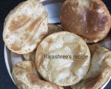 केळीच्या  पुऱ्या (Kelichya Purya Recipe In Marathi) रेसिपी स्टेप 7 फोटो 