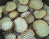 Foto del paso 2 de la receta: Papas gratinadas al horno 🍟