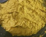 A picture of step 4 of Besan laddoo with sunflower and flax seeds.