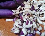 Foto del passaggio 4 della ricetta Calamari ripieni di melanzane su letto di pomodorini