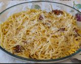 A picture of step 11 of Spaghetti carbonara.