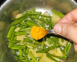 A picture of step 1 of Guvar batata.