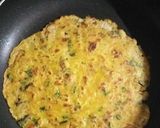 A picture of step 3 of 20 min breakfast vegetable besan cheela.
