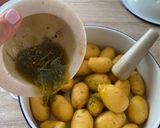 A picture of step 6 of Hasselback truffle roasted potatoes.