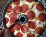 A picture of step 7 of Pizza monkey bread.