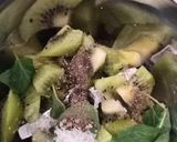 A picture of step 2 of Kiwi Pomegranate mocktail (Layered mocktail).